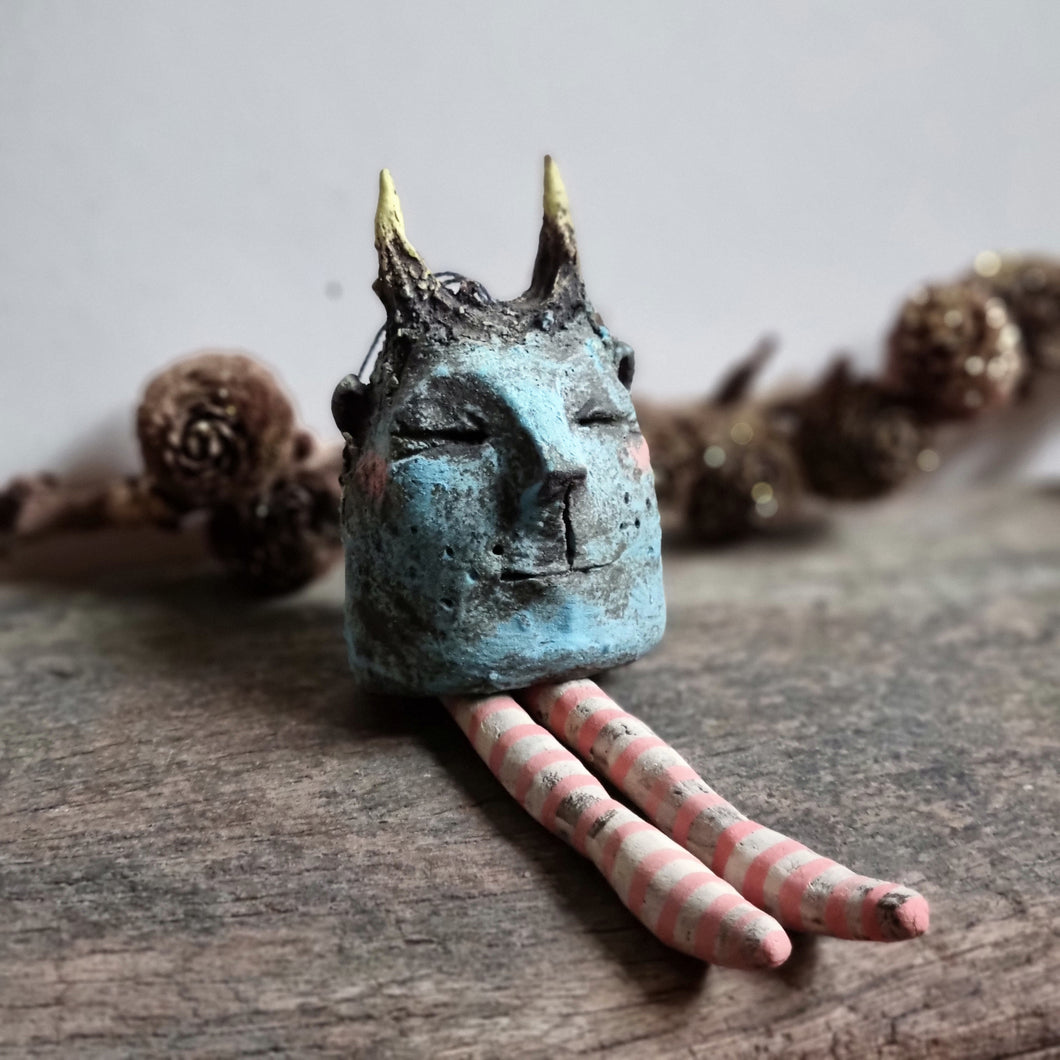 'Little Creature ' stoneware character.
