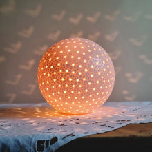 Load image into Gallery viewer, Spherical textured lamp with twinkly pinpricks of light. fine detail created with precision.