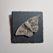 Load image into Gallery viewer, Black Stoneware Moth on slate tile to hang on the wall.

