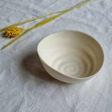 Load image into Gallery viewer, Creamy white porcelain spiral bowl on li.en table cloth.
