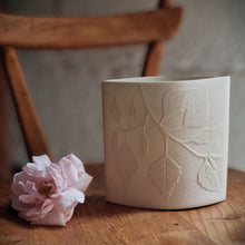 Load image into Gallery viewer, Elliptical white porcelain Lamp with Birch silhouette design etched onto it.