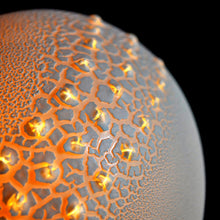 Load image into Gallery viewer, Detail of round Lamp with textured glaze and three rows of raised sparkly bumps running across the middle.