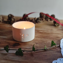 Load image into Gallery viewer, Creamy white porcelain tealight holder with Birds Foot Trefoil design etched into it.
