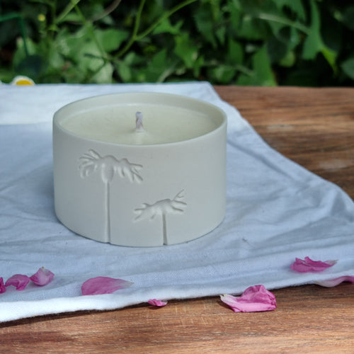 Porcelain Candle Pot etched with a two daisies,