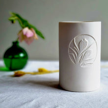 Load image into Gallery viewer, Creamy white beaker with etched Crocus decoration in relief.
