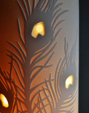 Load image into Gallery viewer, Detail of Lamp with Peacock Feathers design in relief. 
